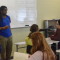 Paducah poet Samuel “Snacks” Hawkins performs for class
