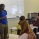 Paducah poet Samuel “Snacks” Hawkins performs for class